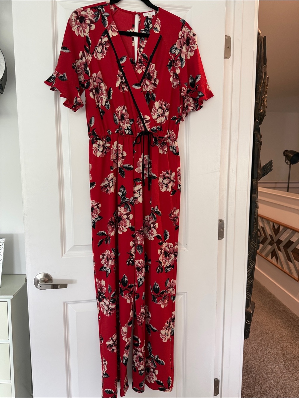Charming Charlie Red Floral Wrap Jumpsuit